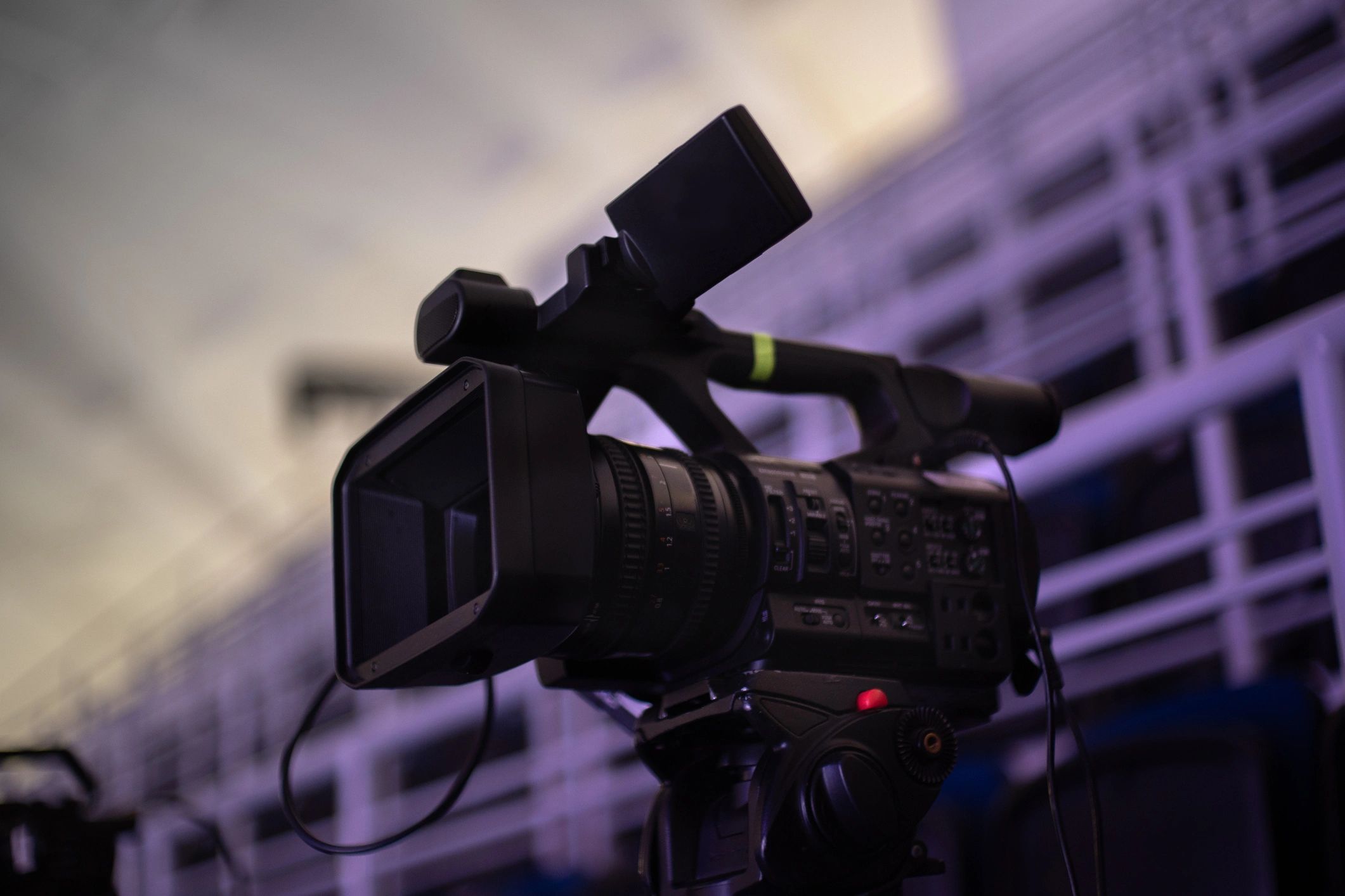 Professional video camera on a tripod ready for filming